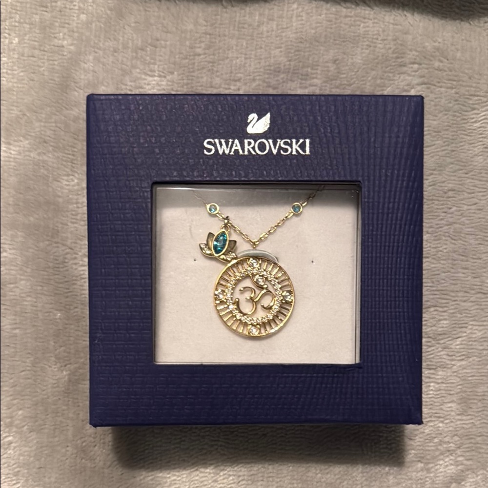 Swarovski Gold Om Necklace with Blue Lotus Accents
